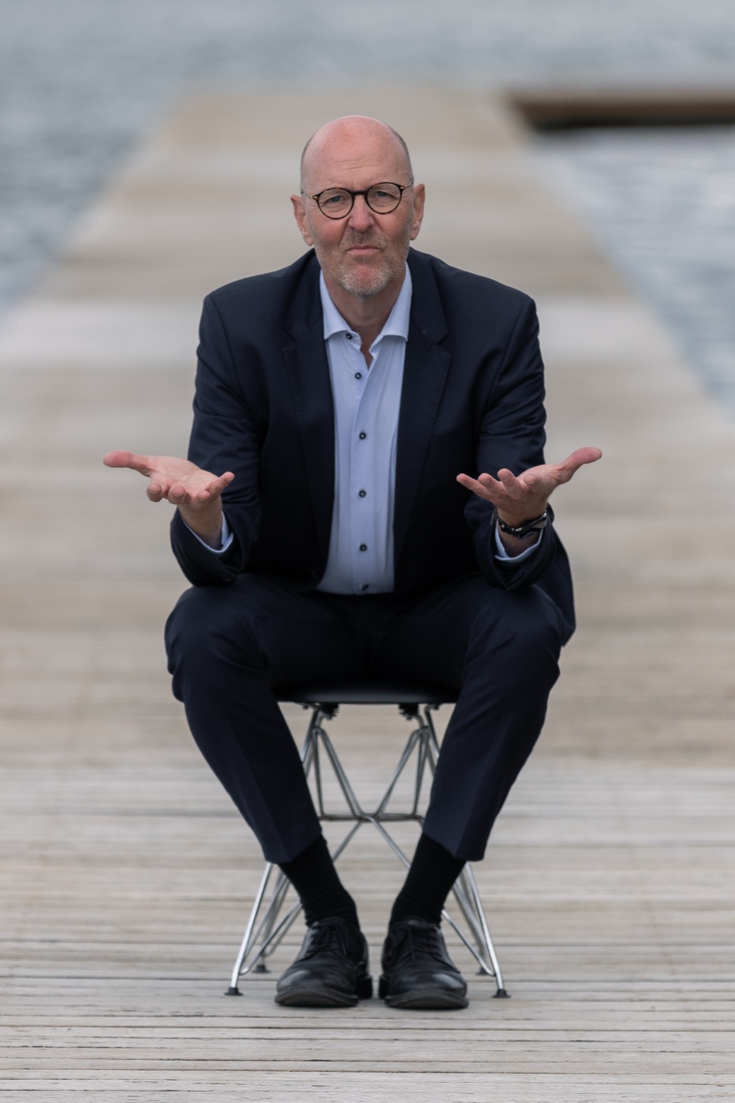 Per Beining seated with open palms — over to you